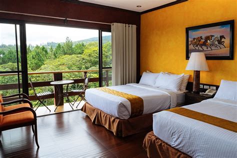 Rooms available at Dahilayan Forest Park Resort .